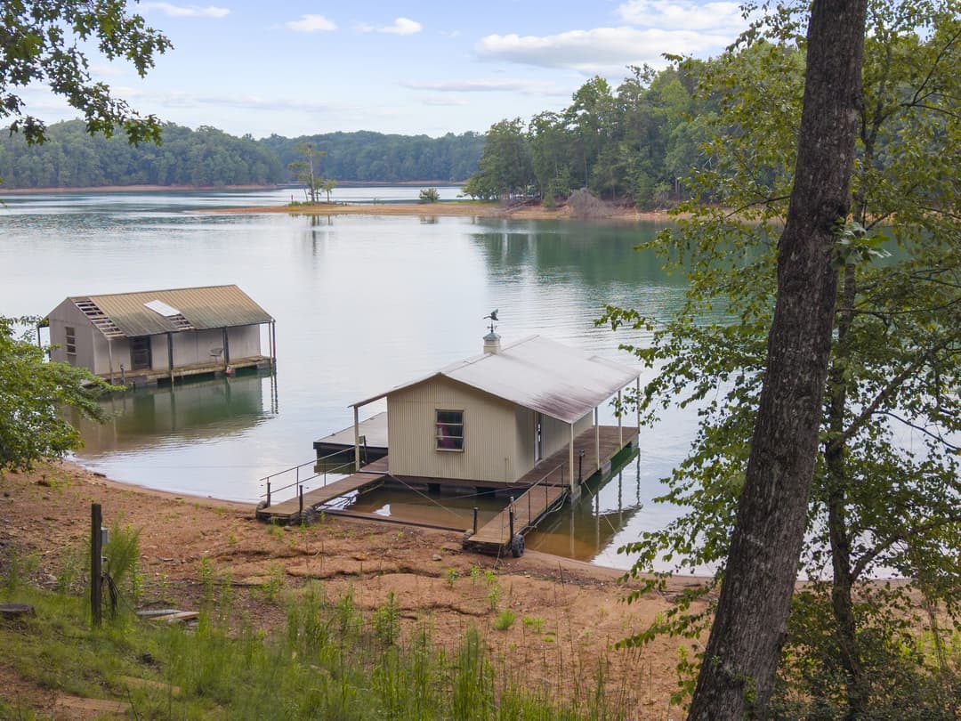 Aerial view of the private Lake Lanier property, shoreline, and dock