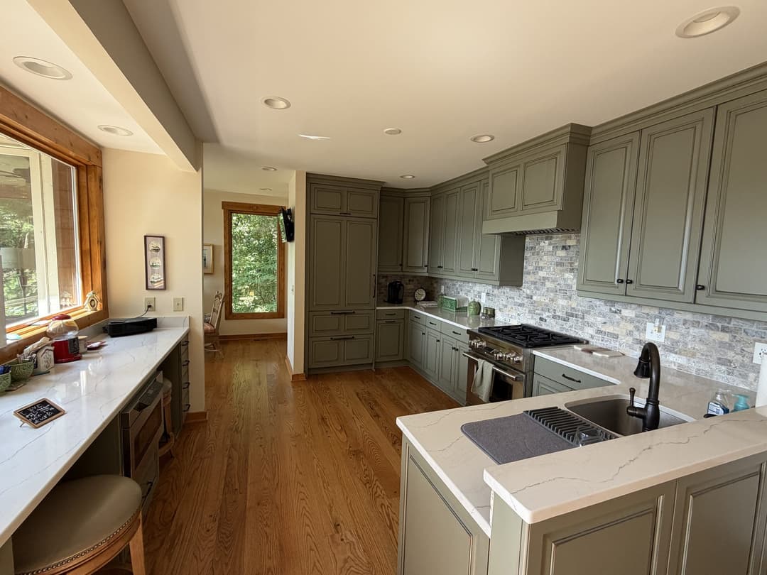 Updated kitchen with hard-surface countertops and hardwood floors