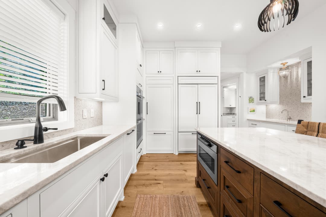 Kitchen breakfast nook with banquette seating and water views
