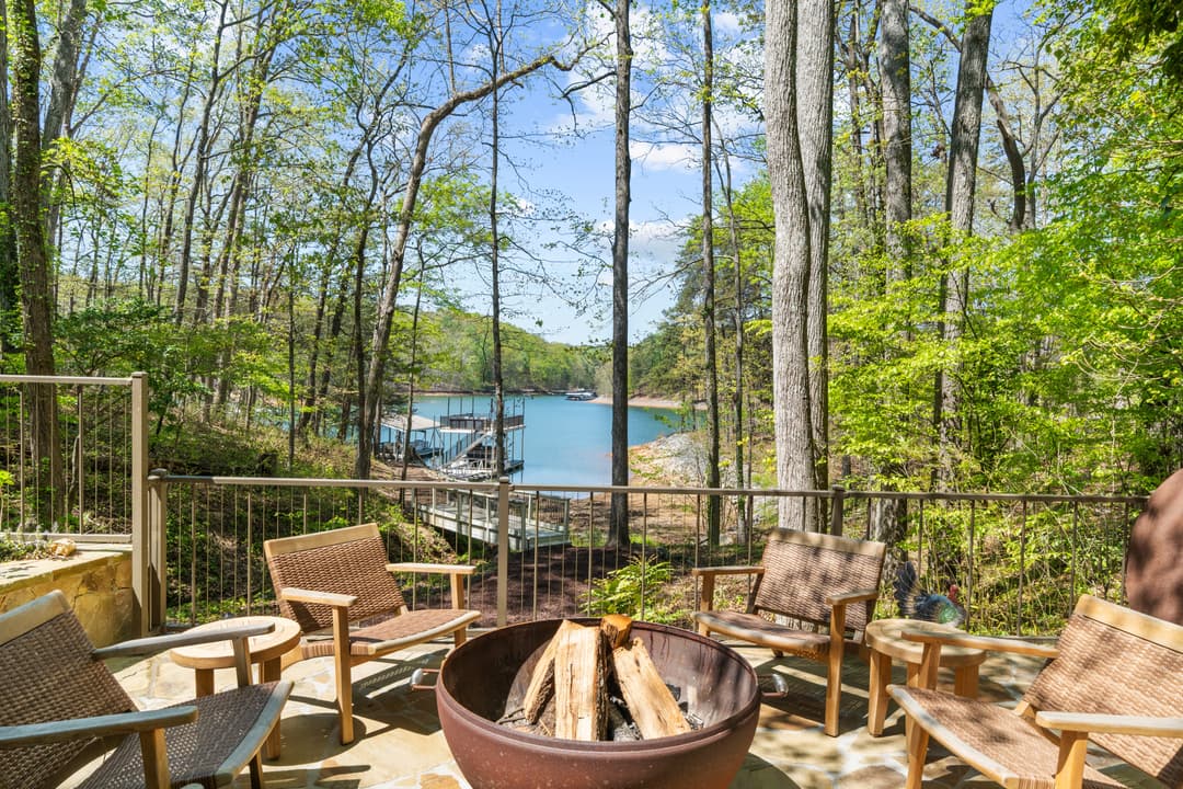 Game room lounge with leather seating and Lake Lanier views