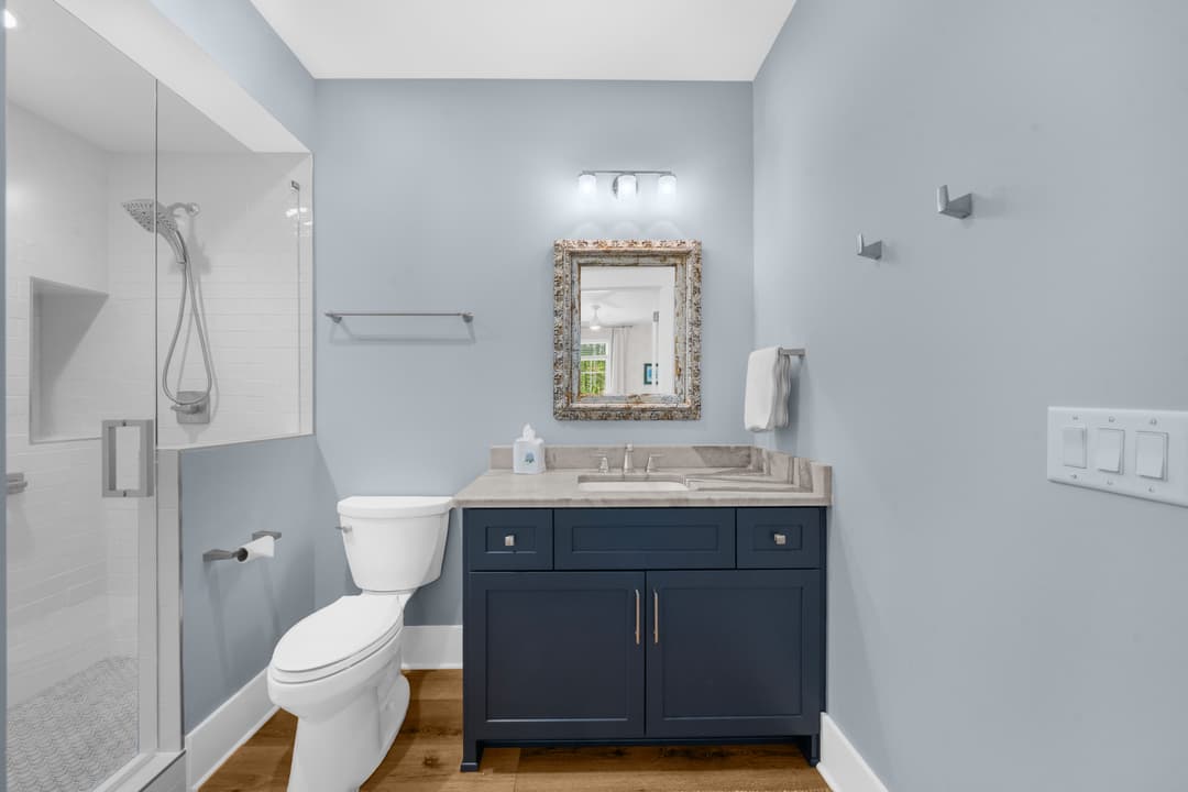 Upper-level full bath serving the game room and Murphy bed area