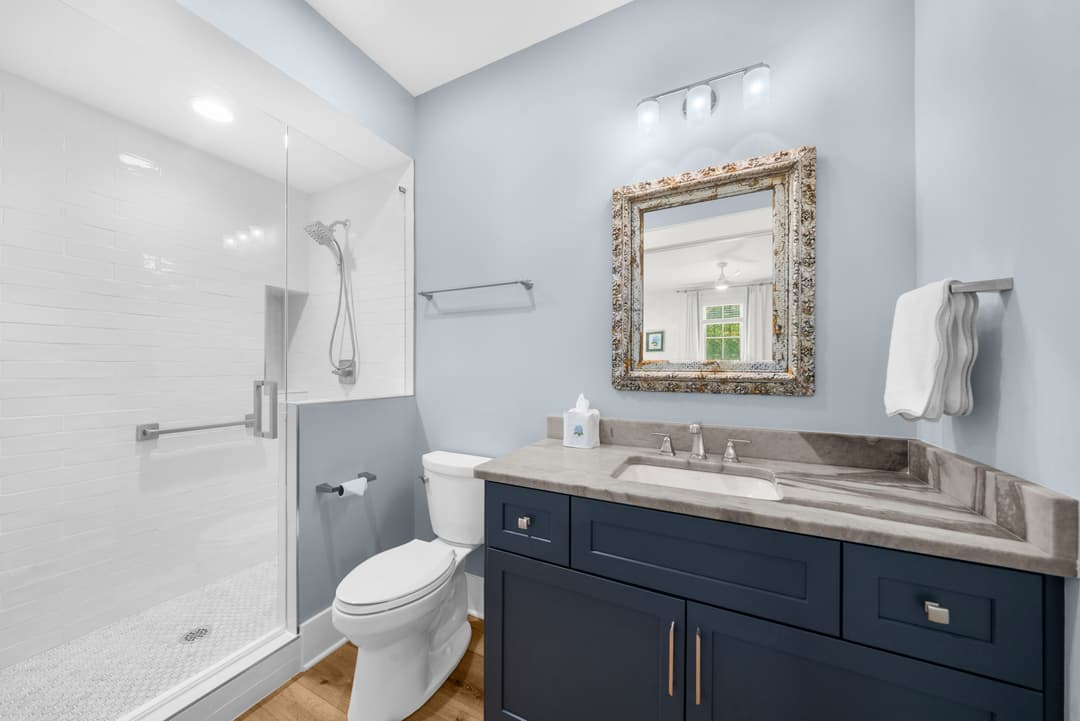Game-room shower with floor-to-ceiling tile
