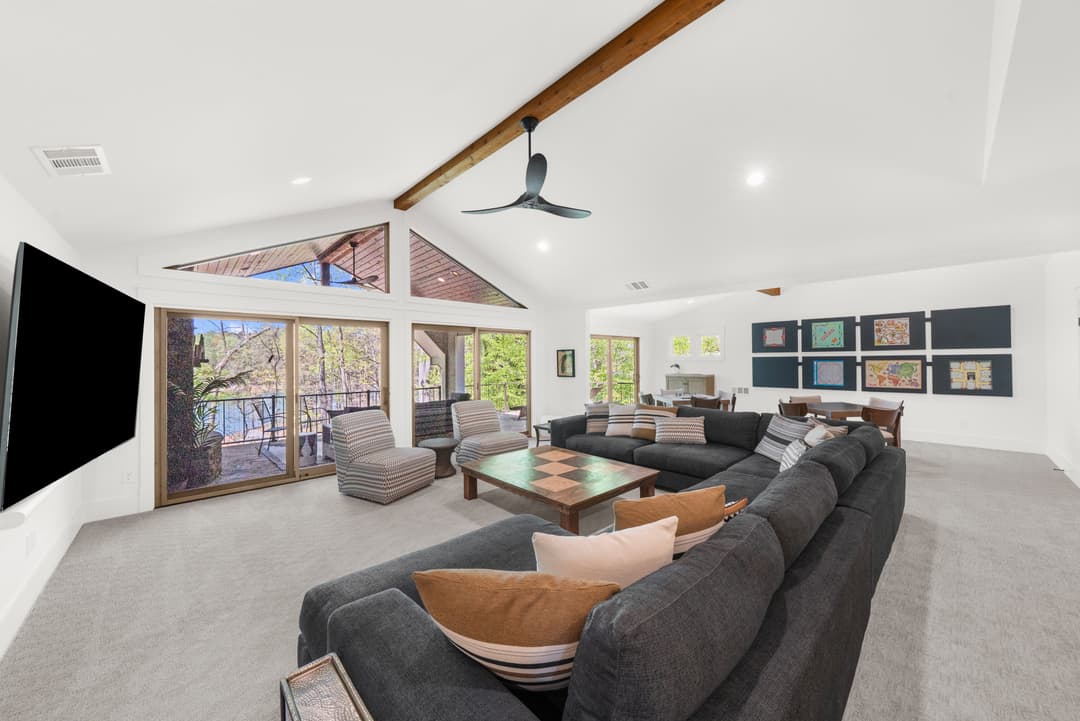 Covered terrace with porch swing overlooking Lake Lanier