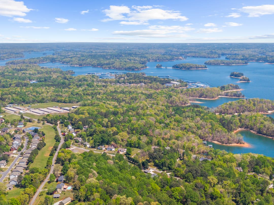 Sunset aerial of the property and Lake Lanier shoreline
