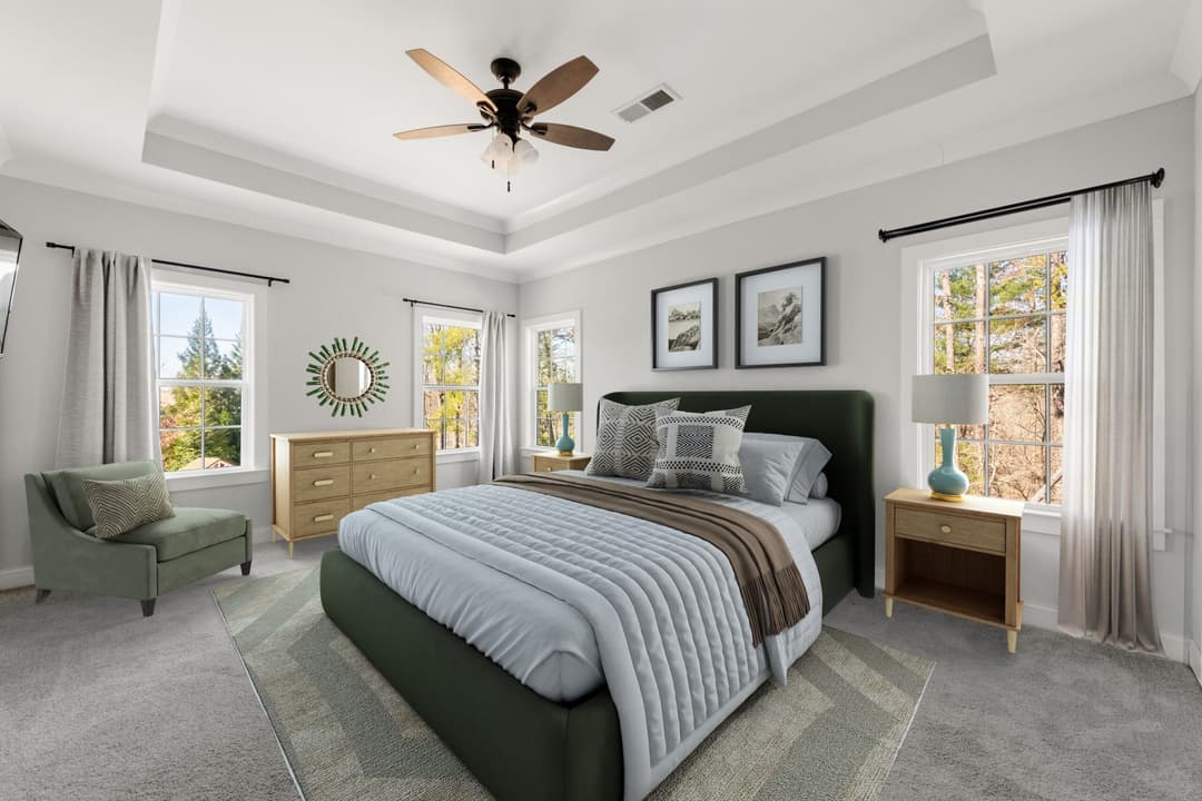 07. Primary bedroom has seasonal lake views virtually staged scaled at 6444 point twenty two