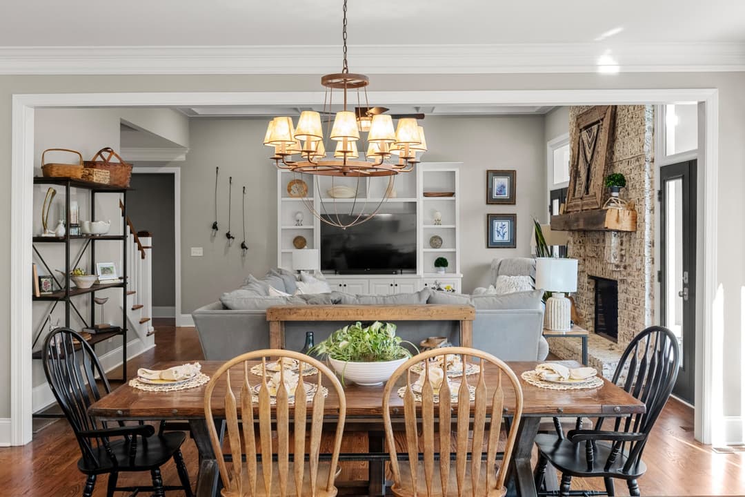 10. Gather your friends and family in this open living dining kitchen with easy indoor outdoor access to the large covered porch