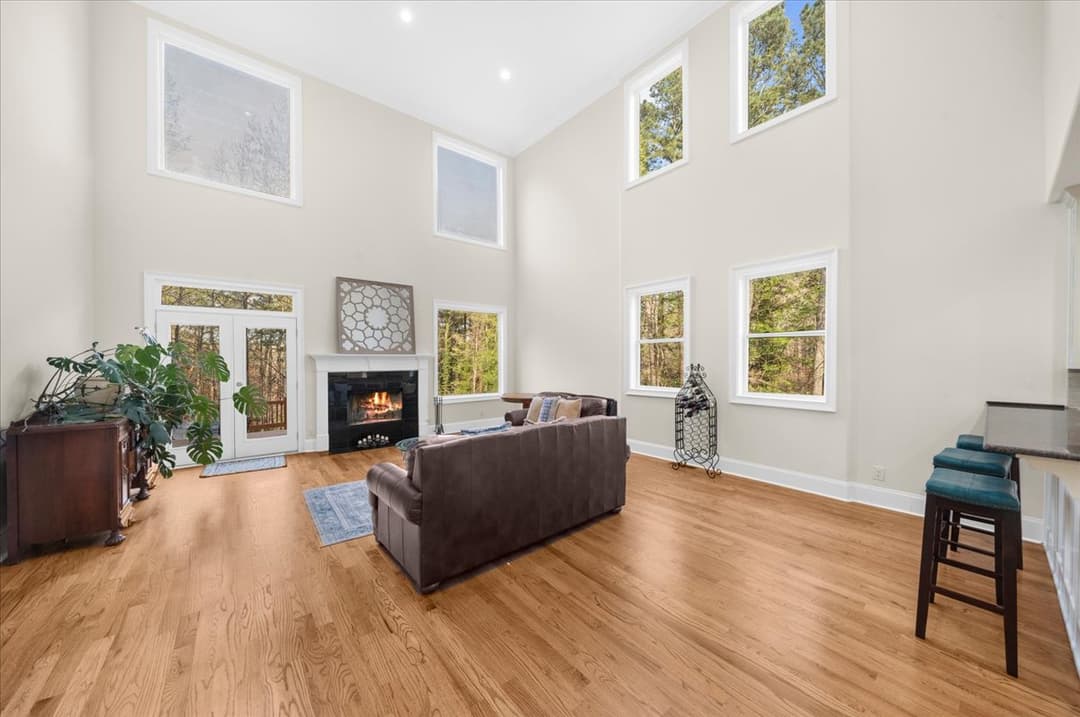 Family room opening onto kitchen, filled with natural light